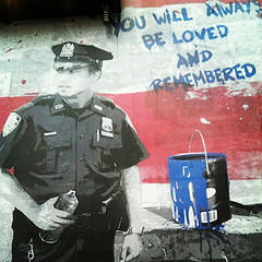 Ironically, graffiti memorializes Officers Liu and Ramos in NYC. Photo by A. Golden via Flickr CC.